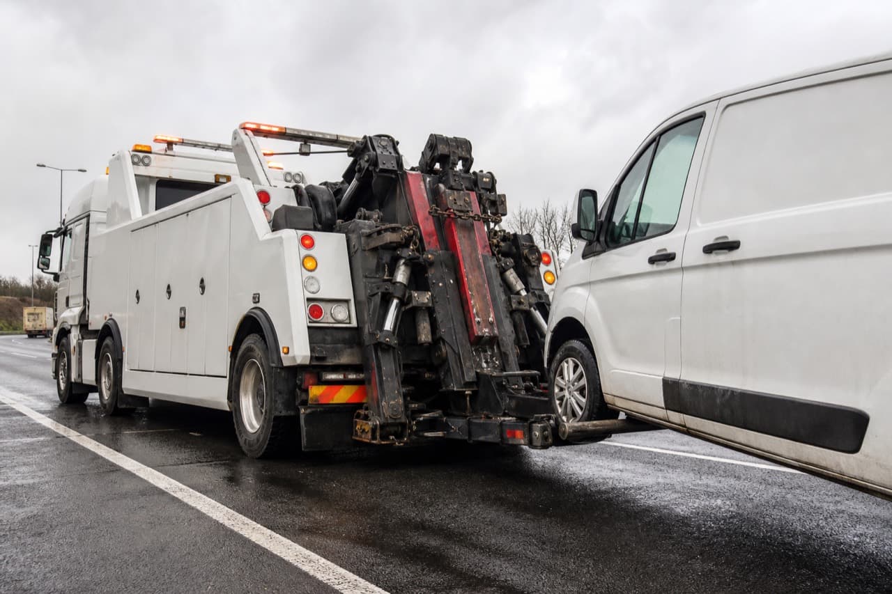 Heavy recovery truck recovering a commercial van